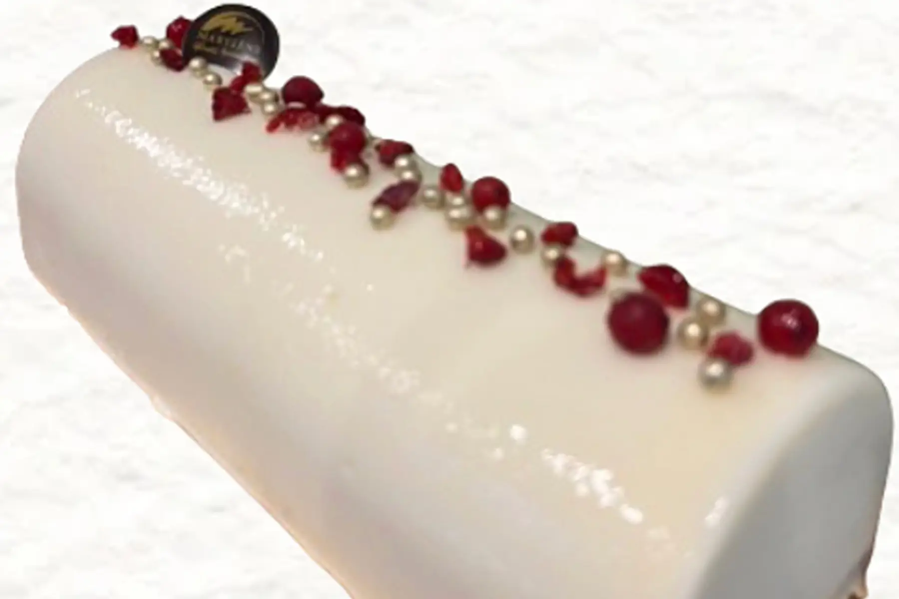 Bûche crème glacée Litchi et sorbet framboise sur biscuit Steusel 8/10 parts